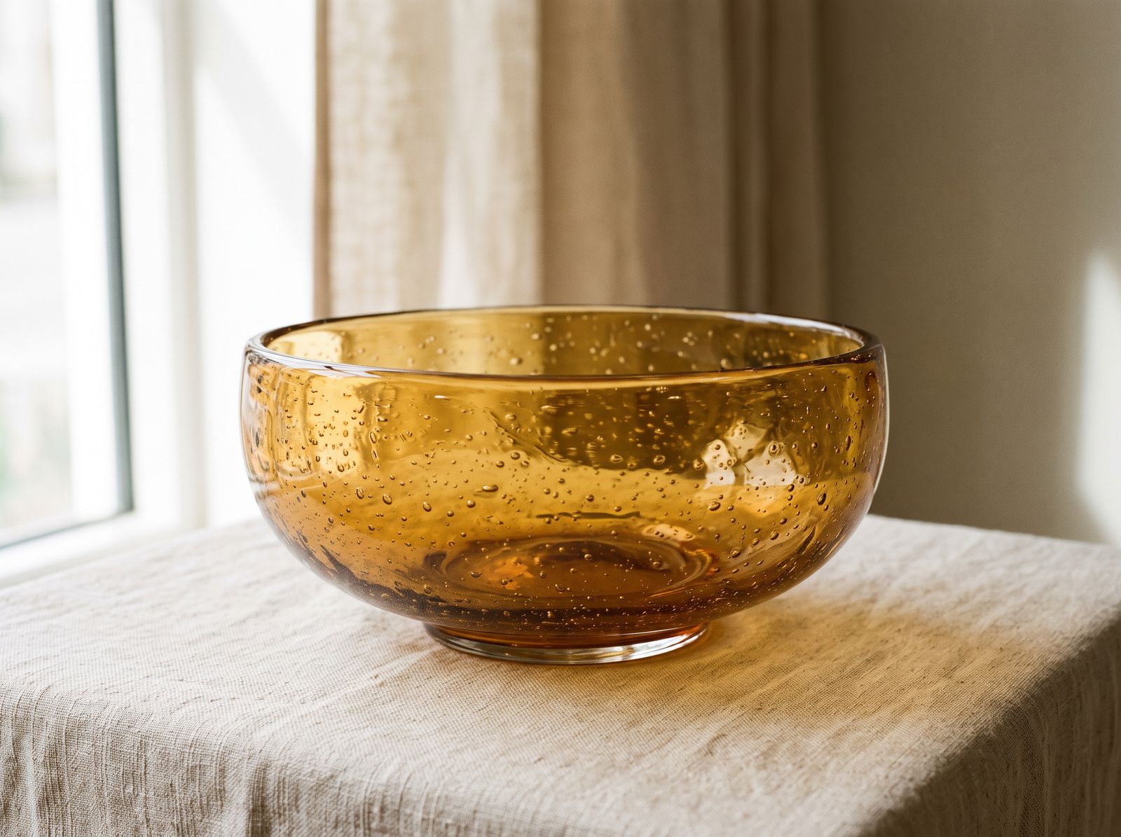 Amber bowl seeded with trapped air bubbles